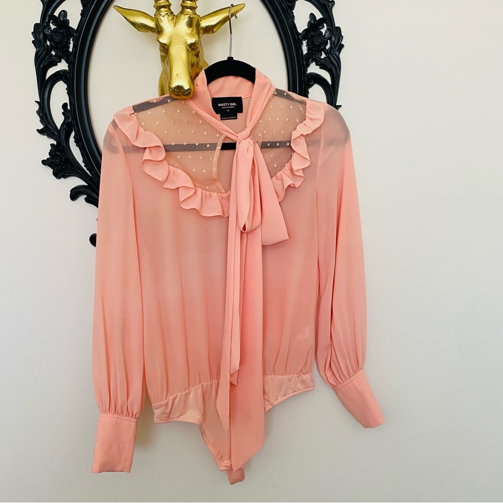 Nasty Gal Peach Pink Long Sleeve Sheer Bodysuit with a Bow and Ruffles